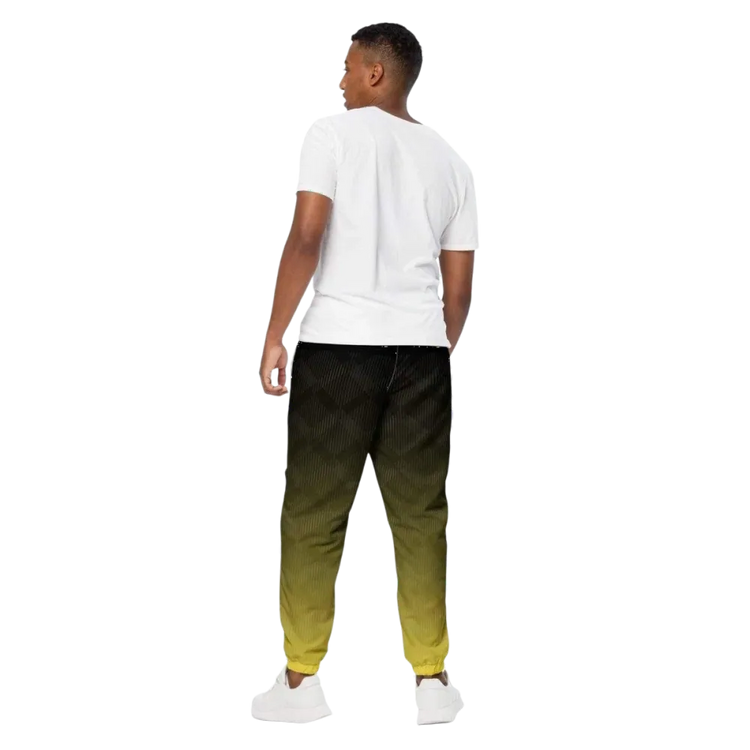 Schwarz-gelbe unisex Trainingshose von BUYATHOME24, wasserabweisend mit Reißverschlusstaschen, in XS bis 3XL, sportlich und bequem.