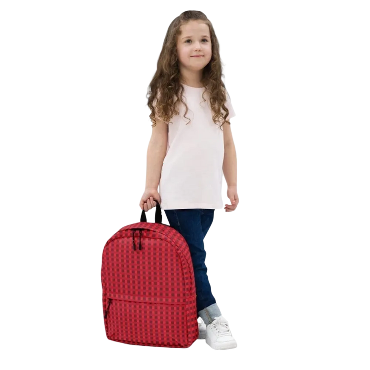 Schulrucksack von BUYATHOME24, wasserabweisend mit 15 Zoll Laptopfach, Mädchen trägt den Rucksack, textile Design, 42 cm hoch