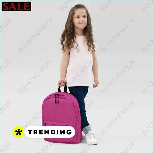 Schulrucksack für Kinder von BUYATHOME24, wasserabweisend mit 15 Zoll Laptopfach und kindgerechtem Design, auf Mädchen getragen.