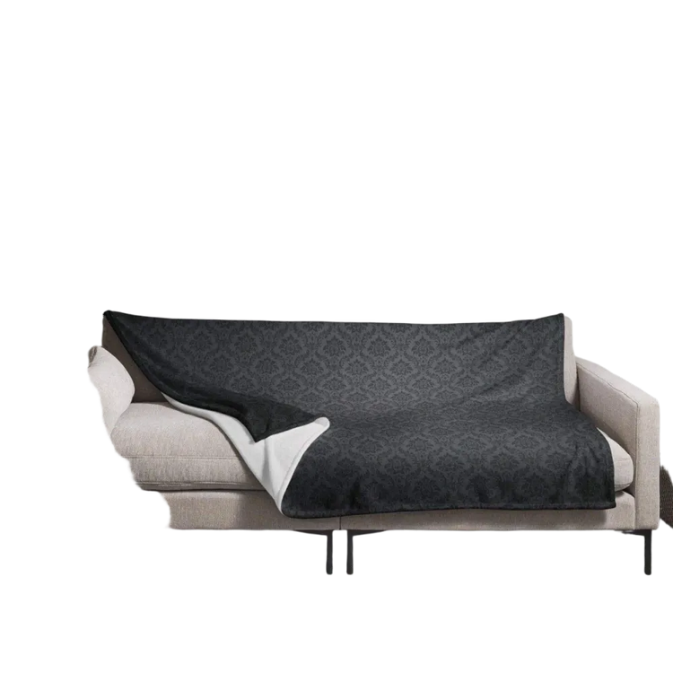 Weiche Polyester-Kuscheldecke 125x150cm von BUYATHOME24, gemütliche Sofadecke für angenehme Stunden auf dem Sofa.