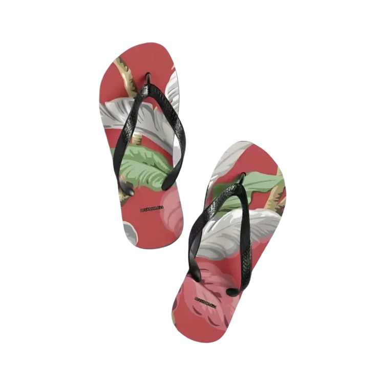 Unisex Strand Flip-Flops von BUYATHOME24 mit Gummisohle und Polyester, Größe 37-45, liegen auf einem Strandtuch.