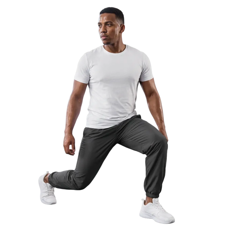 Dunkelgraue Unisex Trainingshose von BUYATHOME24, wasserabweisend und atmungsaktiv, in XS bis 3XL, liegt flach auf einer Oberfläche