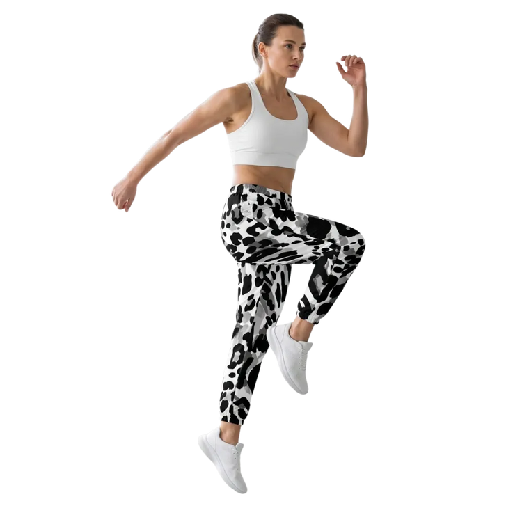 Unisex Trainingshose aus Polyester mit Reißverschlusstaschen, in XS bis 3XL, bequem und sportlich, von BUYATHOME24