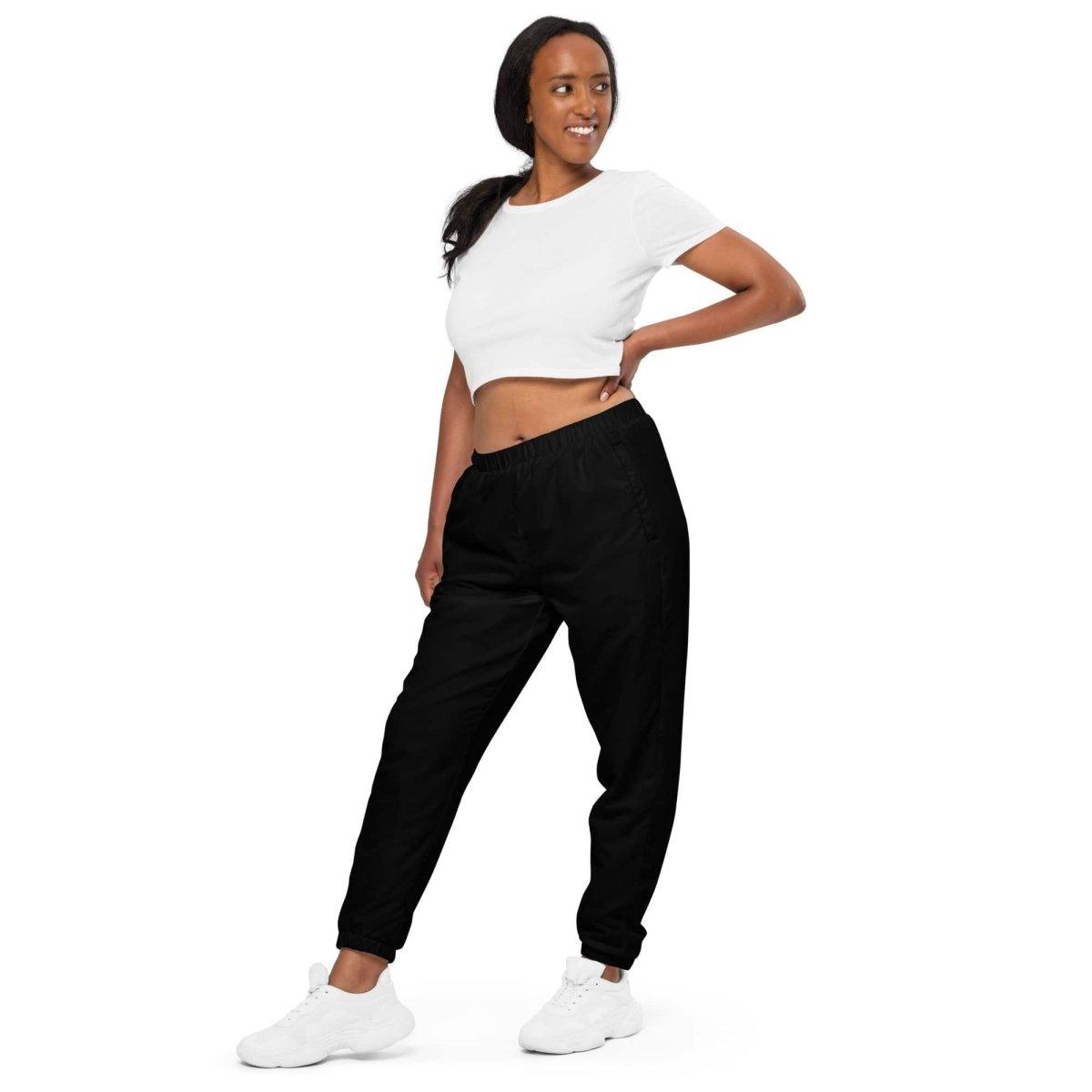 Schwarze Unisex Trainingshose aus Polyester, wasserabweisend, für Damen, in XS bis 3XL, mit Textildruck von BUYATHOME24