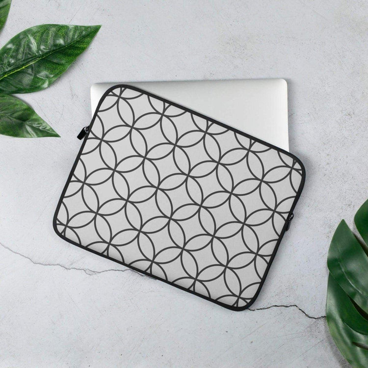 Laptoptasche aus Neopren mit Kunstfell-Innenfutter, stoßfest für 13 und 15 Zoll Notebooks, in Schwarz mit Druckmuster.