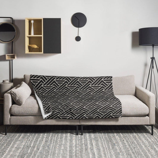 Hypoallergene und flammhemmende Sofadecke 125x150 cm von BUYATHOME24, weiche Textur, ideal für gemütliche Stunden auf dem Sofa.
