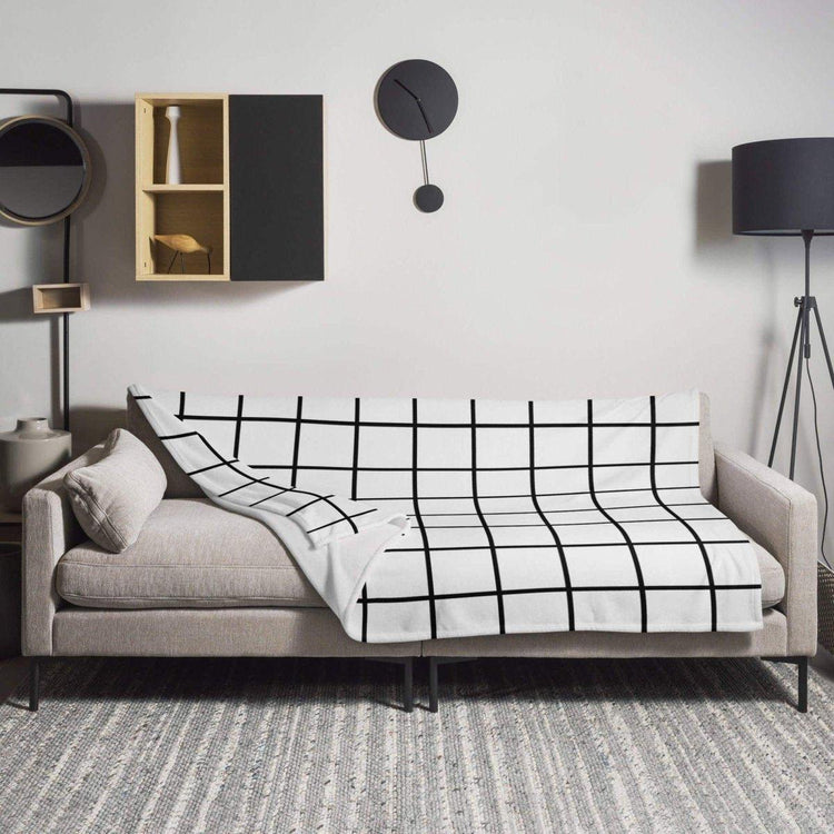 Hypoallergene Sofadecke 125x150 cm aus Polyester von BUYATHOME24, weiche Kuscheldecke für gemütliche Abende, Textildruck.