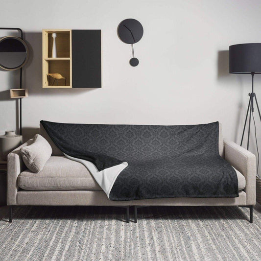 Weiche Polyester-Kuscheldecke 125x150cm von BUYATHOME24, gemütliche Sofadecke für angenehme Stunden auf dem Sofa.