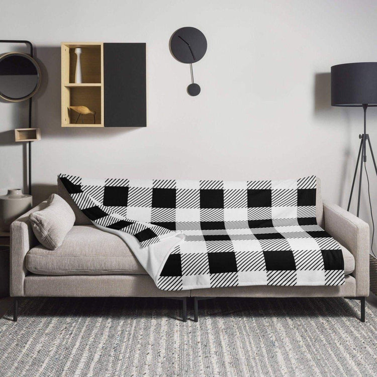 Hypoallergene Sofadecke 125x150cm aus Polyester von BUYATHOME24, weiche Kuscheldecke für gemütliche Abende.