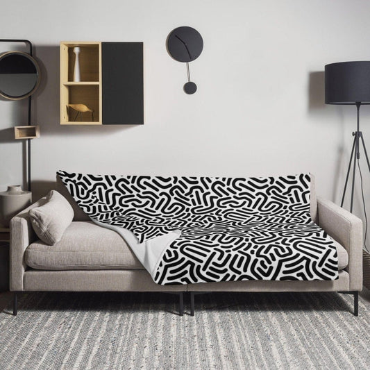 Hypoallergene Sofadecke 125x150 cm aus Polyester von BUYATHOME24, weiche Kuscheldecke für gemütliche Abende.