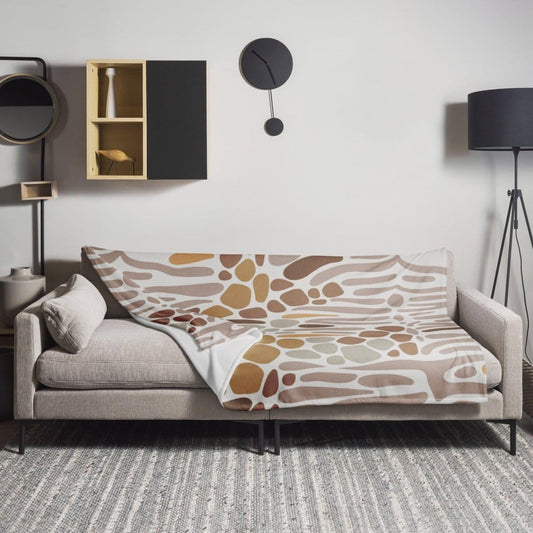Hypoallergene und flammhemmende Sofadecke 125x150 cm von BUYATHOME24, weiche Textiloberfläche, perfekt für gemütliche Stunden.