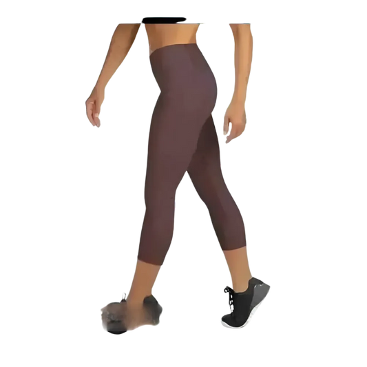 Damen Capri-Leggings von BUYATHOME24, Sportleggings mit UV-Schutz, in XS bis XL, ideal für Yoga und Sport, auf weißem Hintergrund.