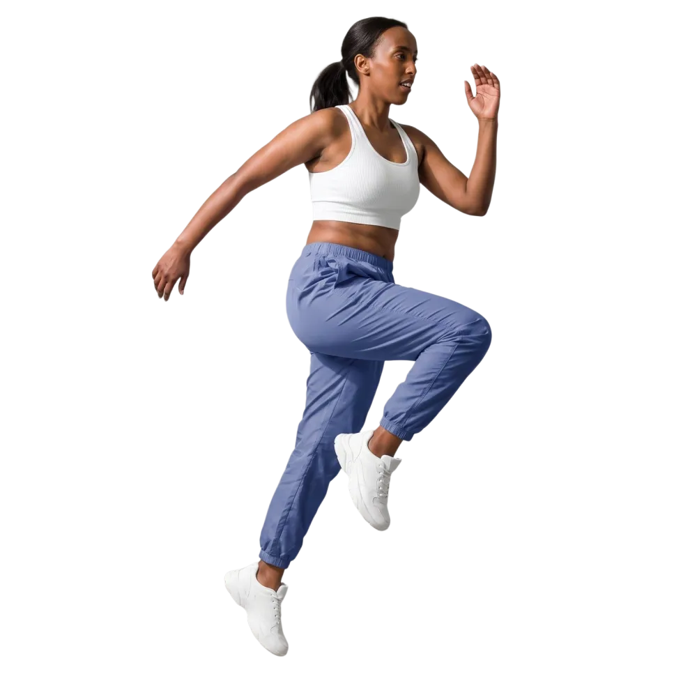 Hellblaue Unisex Trainingshose von BUYATHOME24 aus wasserabweisendem Polyester, verfügbar in XS bis 3XL, mit elastischem Bund.
