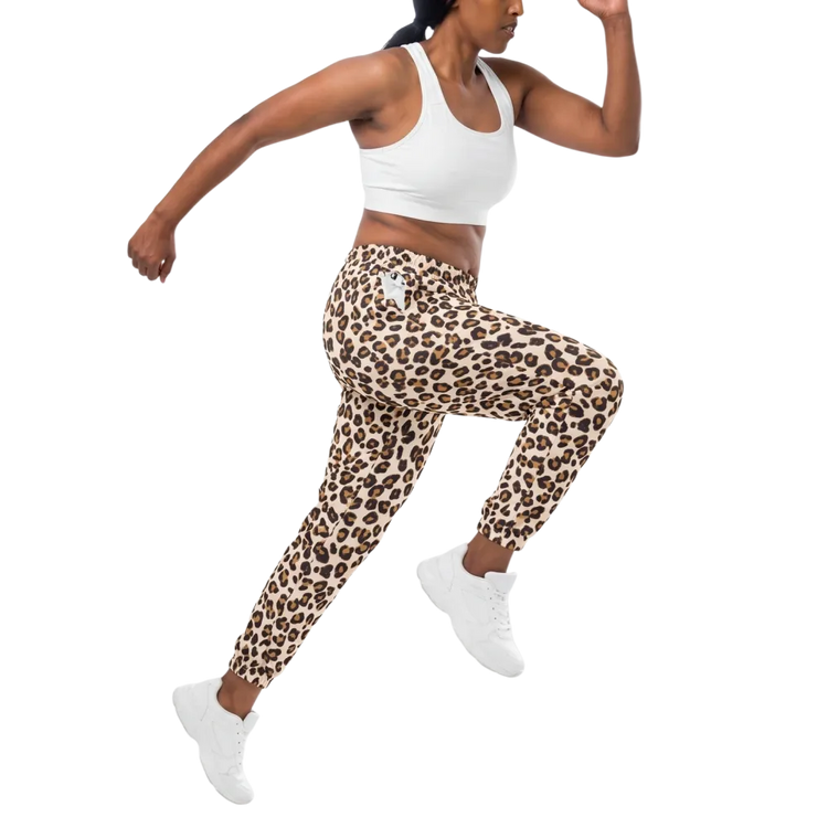 Leopardenmuster Unisex Trainingshose aus Polyester mit Reißverschlusstaschen, in XS bis 3XL, bequem und stylisch.