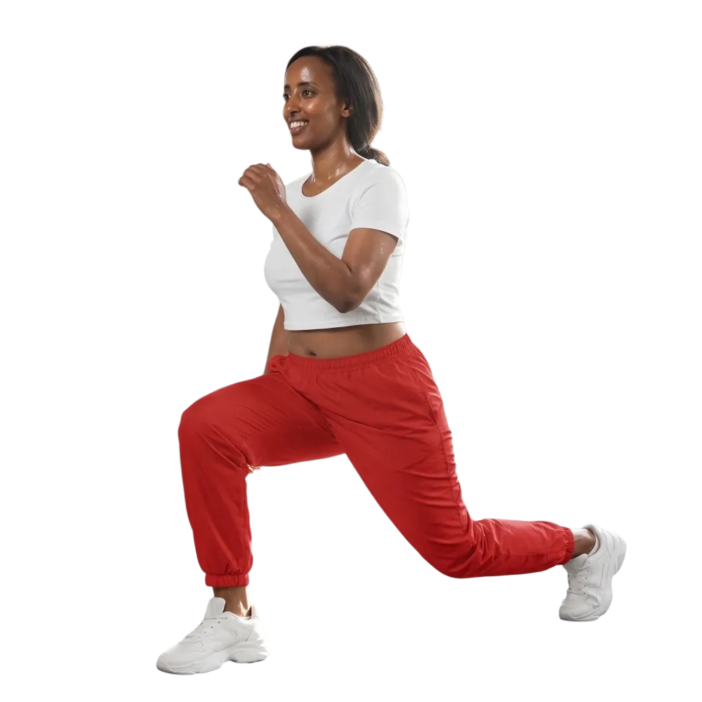 Rote unisex Trainingshose von BUYATHOME24, wasserabweisende Sporthose in XS bis 3XL, bequem und sportlich.