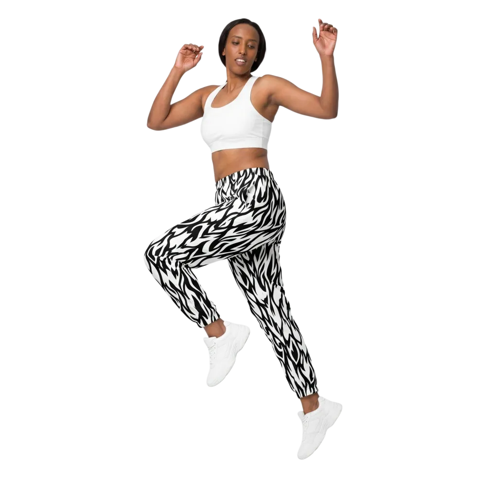 Unisex Trainingshose aus Polyester mit Mesh-Futter, in XS bis 3XL, zeigt elastischen Bund und atmungsaktives Material.