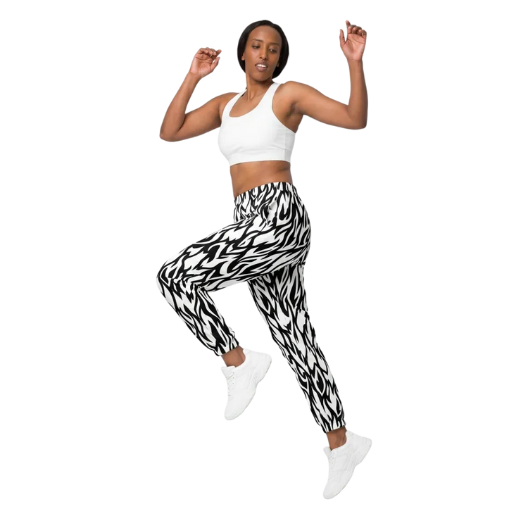 Unisex Trainingshose aus Polyester mit Mesh-Futter, in XS bis 3XL, zeigt elastischen Bund und atmungsaktives Material.