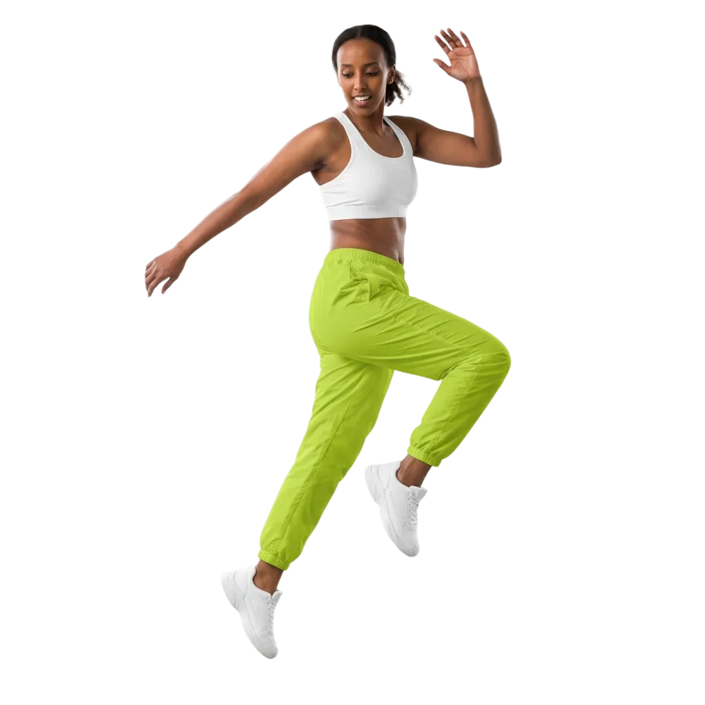 Zitronengelbe Unisex Trainingshose aus Polyester mit Mesh-Futter, bequem und sportlich, in den Größen XS bis 3XL.